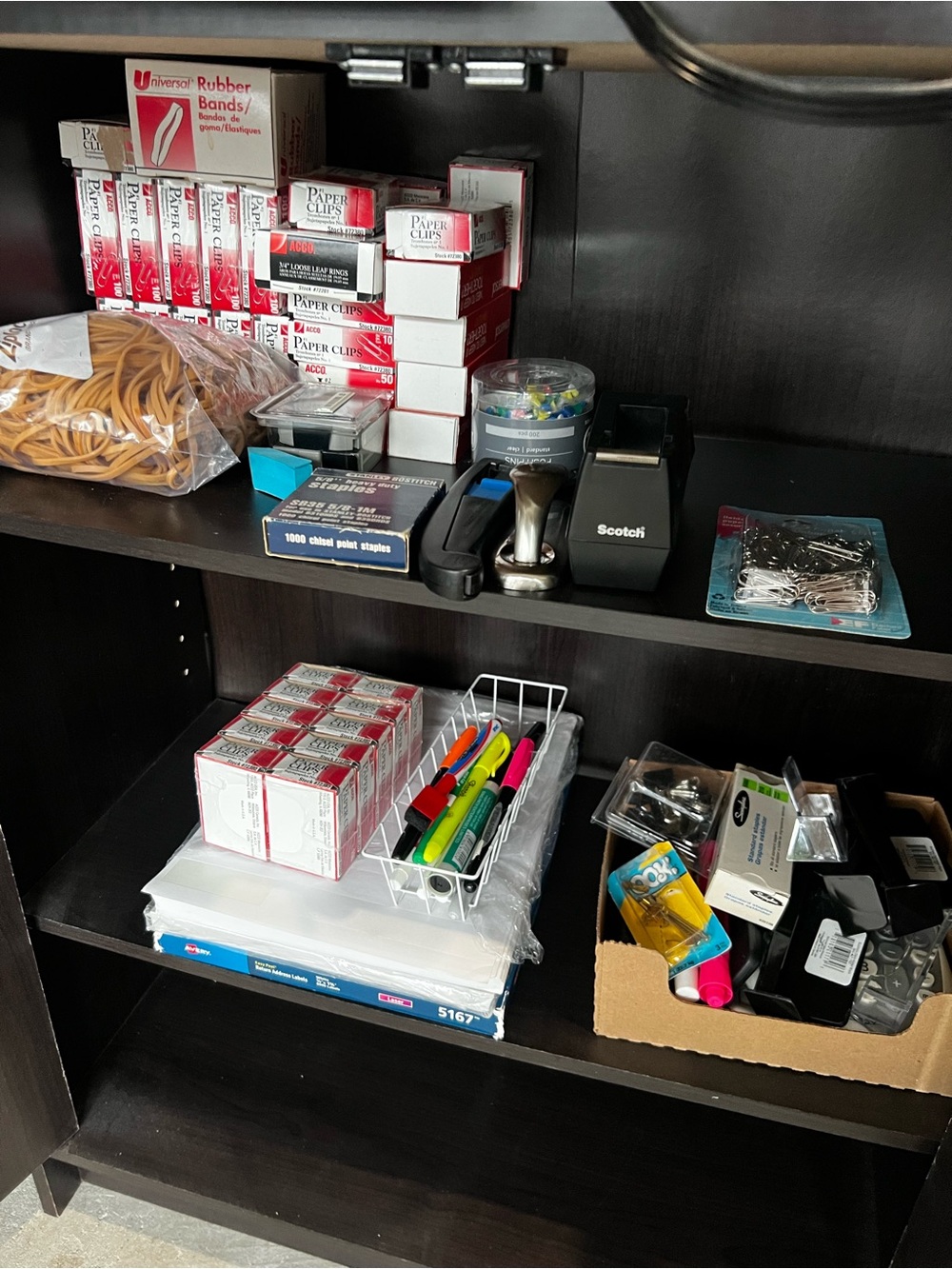 Assorted Office Supplies Shelf - Black Tape Dispenser & Staples